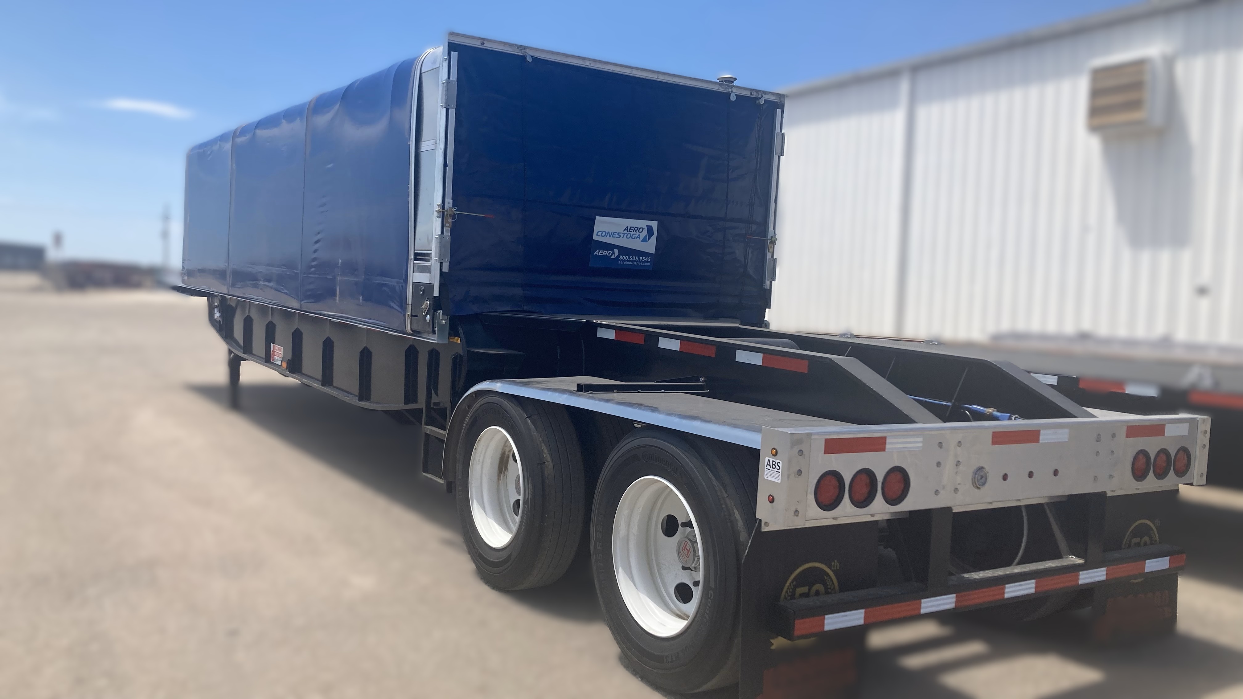rear driver side photo with tarp.jpg